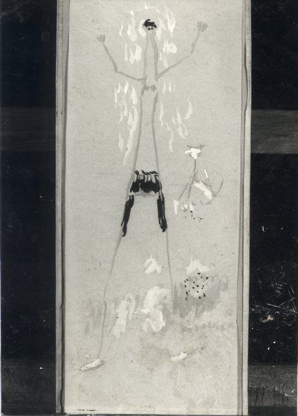 Personnage représenté sur une toile peinte posée à terre.