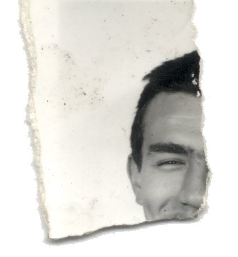 Tête d’homme brun l’œil souriant. Fragment.